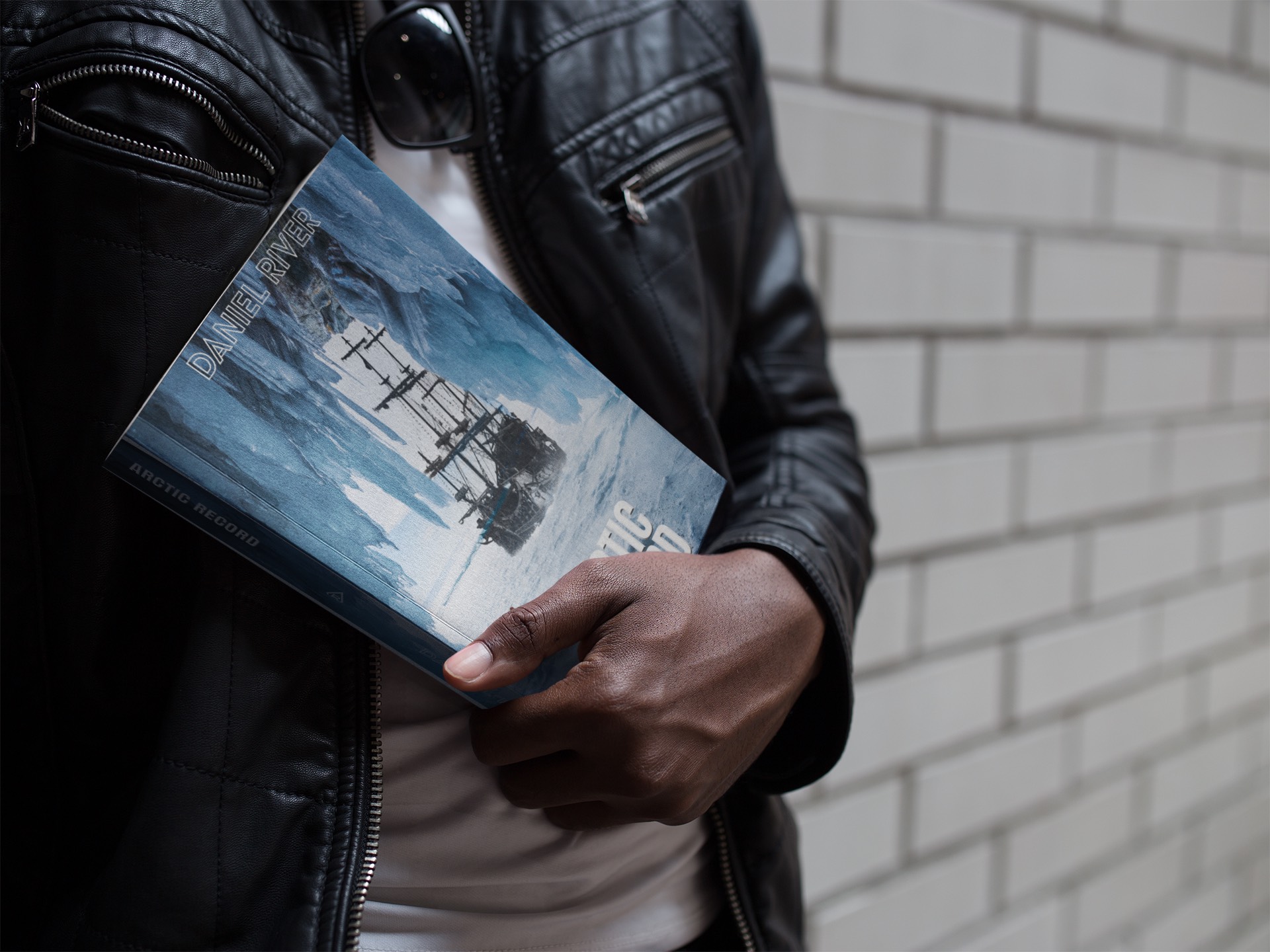 Reader with Arctic Record book